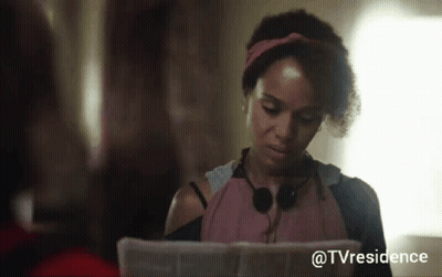 Woman In Headphones Looking At Tvresidence Paper GIF