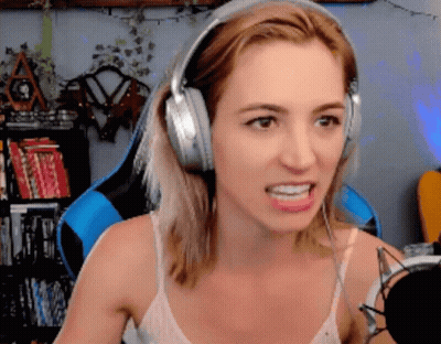 Woman In Headphones Making Funny Face At Microphone GIF