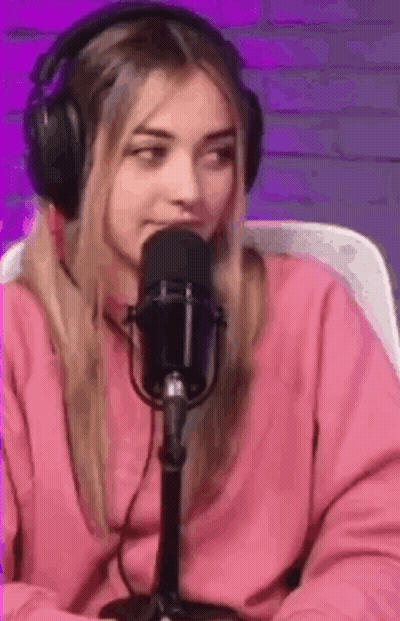 Woman In Headphones Sitting At Microphone GIF