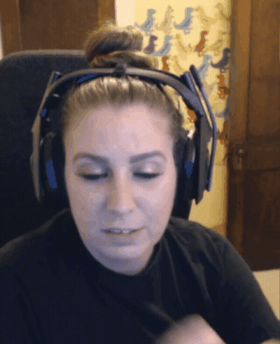 Woman In Headphones Sitting In Chair Eyes Closed GIF