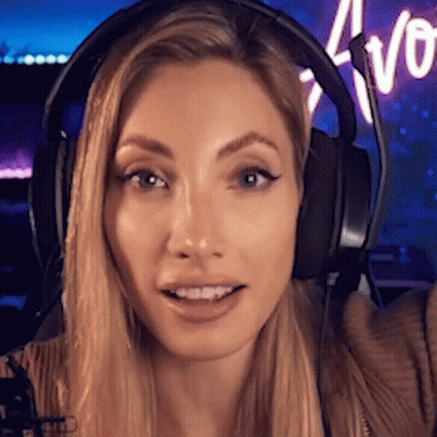 Woman In Headphones Smiling At Camera GIF