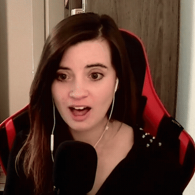 Woman In Headphones Talking Into Microphone In Red Chair GIF