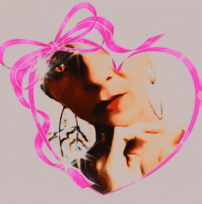 Woman In Heart With Pink Bow GIF
