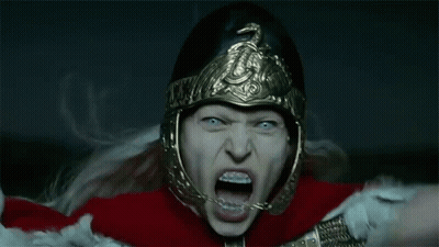 Woman In Helmet And Armor Screaming GIF