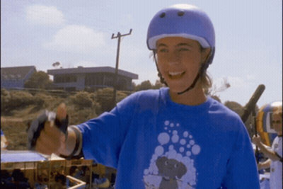 Woman In Helmet And Blue Shirt With Elephant GIF