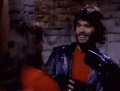 Woman In Helmet And Red Jacket Talking On Cell Phone GIF