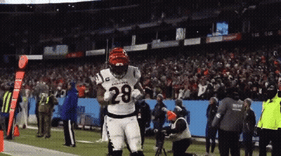 Woman In Helmet And Red Jacket Talking On Cell Phone GIF