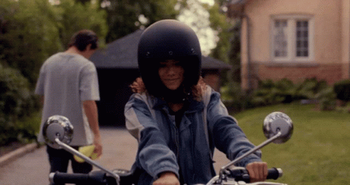 Woman In Helmet Rides Motorcycle GIF