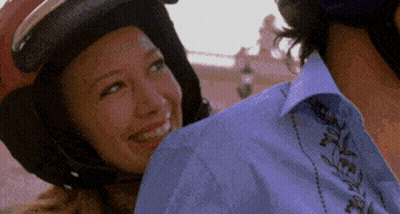 Woman In Helmet Smiling At Man GIF
