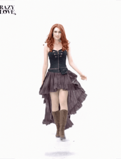 Woman In High Low Skirt And Corset Saying Crazy Love GIF