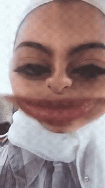 Woman In Hijab Making Funny Face GIF