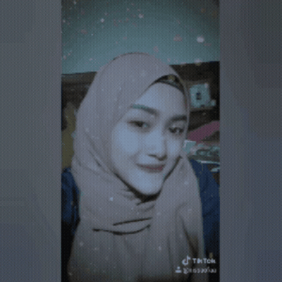Woman In Hijab Taking Selfie GIF