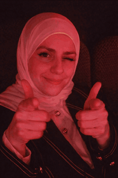 Woman In Hijab Thumbs Up Saying Pew Pew Pew GIF