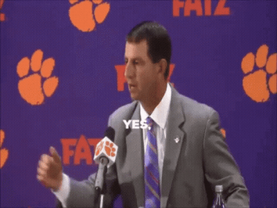 Woman In Hokies Jersey Laughing In Stands GIF
