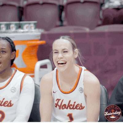 Woman In Hokies Jersey Laughing In Stands GIF