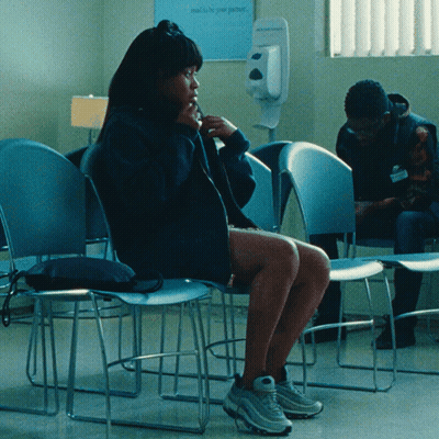 Woman In Hooded Jacket Asking Can She Come In GIF