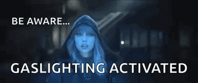 Woman In Hooded Jacket Dark Room Be Aware Gaslighting Activated GIF