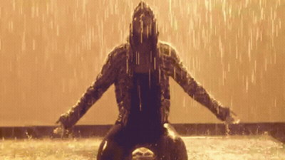 Woman In Hooded Jacket In Rain Arms Outstretched GIF
