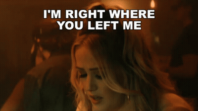 Woman In Hooded Jacket In Red Room With Other Mommy GIF