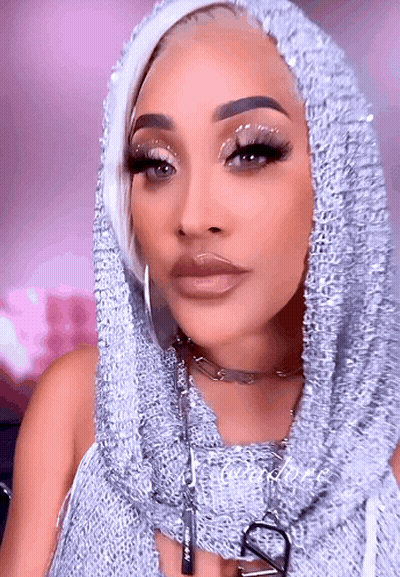 Woman In Hooded Sweater With Letter V GIF