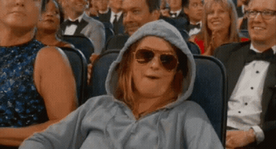 Woman In Hoodie And Sunglasses At Movie Theater GIF