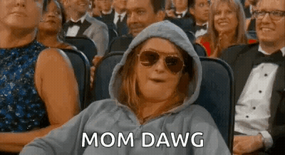 Woman In Hoodie And Sunglasses Watching Movie GIF