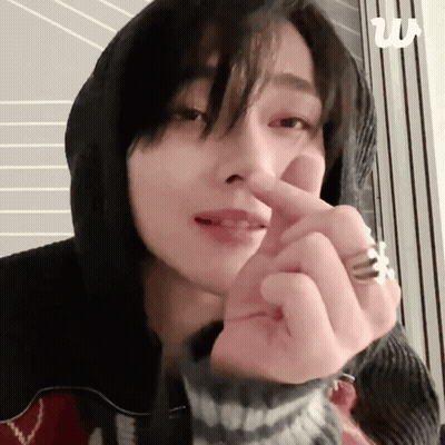 Woman In Hoodie Making Heart Shape GIF