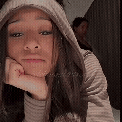 Woman In Hoodie With CelebMomentsss GIF