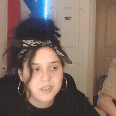 Woman In Hoop Earrings And Headband With S GIF