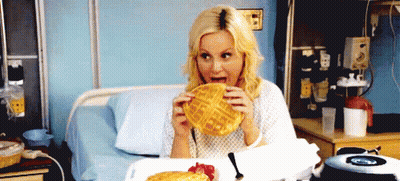 Woman In Hospital Bed Eating Waffles GIF