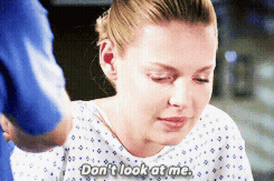 Woman In Hospital Gown Saying Don't Look At Me GIF