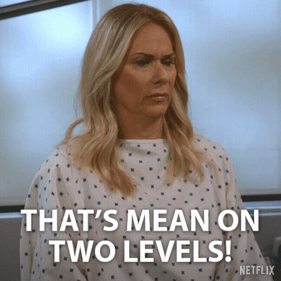 Woman In Hospital Gown Saying That's Mean On Two Levels GIF