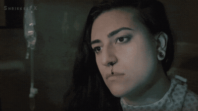 Woman In Hospital Gown With Needle In Nose Shriekerx GIF