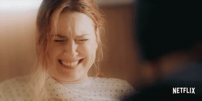 Woman In Hospital Gown With Netflix GIF