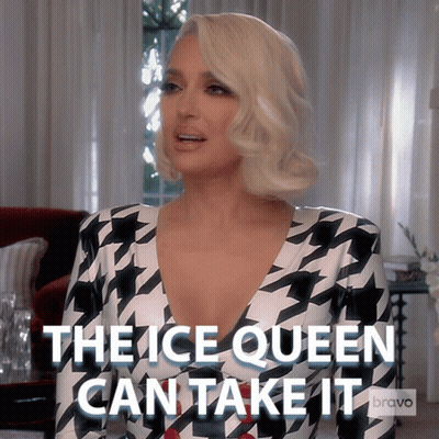Woman In Houndstooth Dress Says The Ice Queen Can Take It GIF