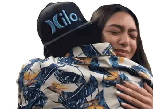 Woman In Hurley Hat Hugging Man Sticker