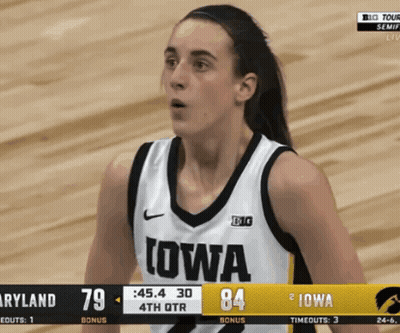 Woman In Iowa Jersey On Basketball Court GIF