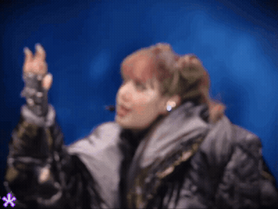 Woman In Jacket And Gloves GIF