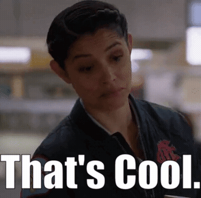 Woman In Jacket Saying That's Cool GIF