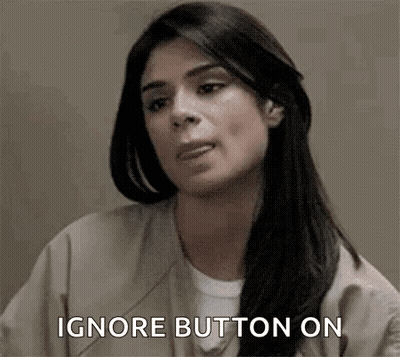 Woman In Jail Cell Saying Ignore Button GIF