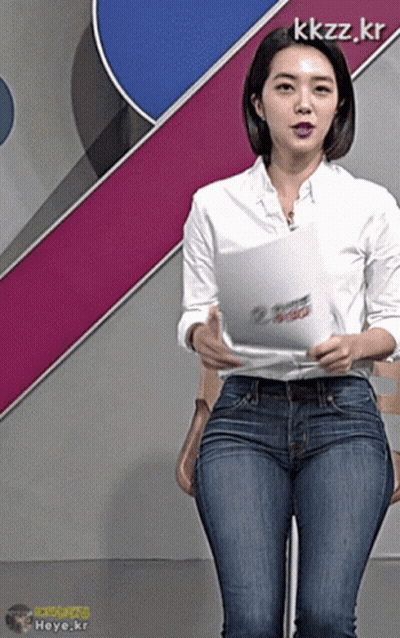 Woman In Jeans Holding Paper With Kkzz.kr GIF