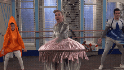 Woman in Jellyfish Costume Surrounded by People