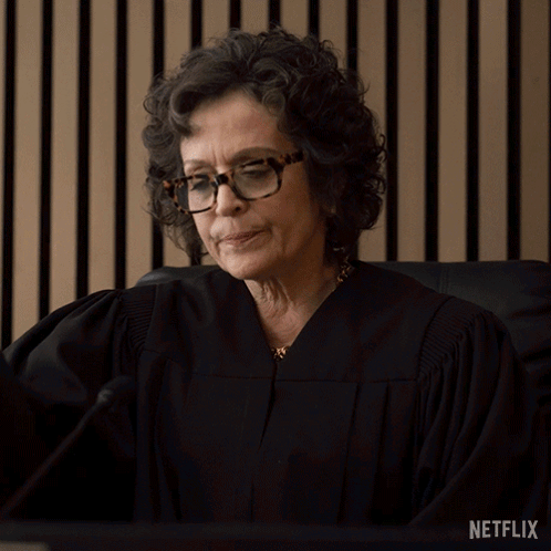 Woman In Judge Robe Says Continue Netflix Ad GIF