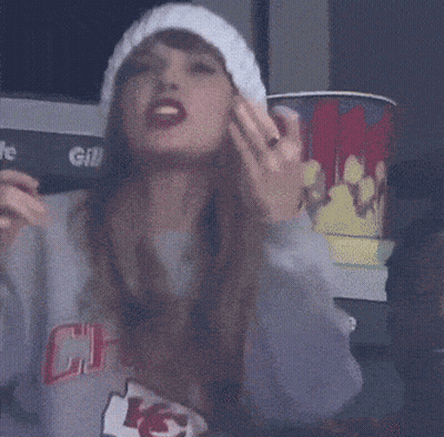 Woman In KC Logo Sweatshirt GIF