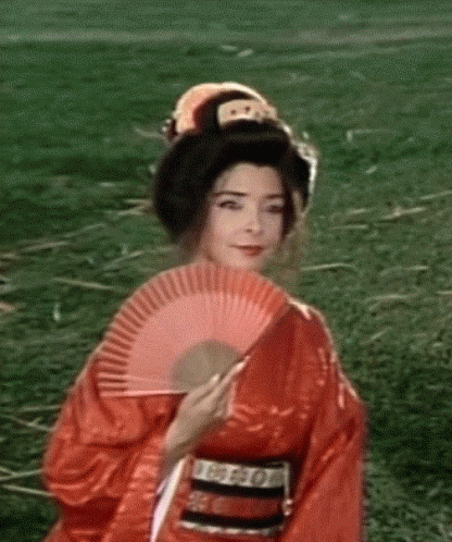 Woman In Kimono Holding Fan GIF