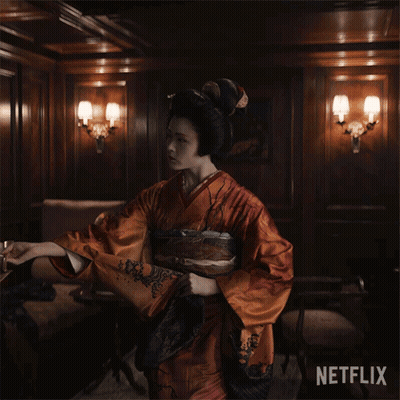 Woman In Kimono Holding Netflix Fan GIF