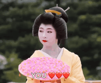 Woman In Kimono Holding Pink Flowers Saying You GIF