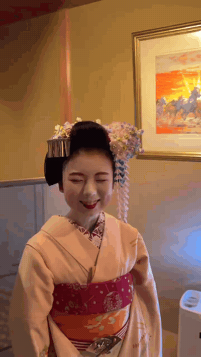 Woman in Kimono Smiling in Front of Horse Picture