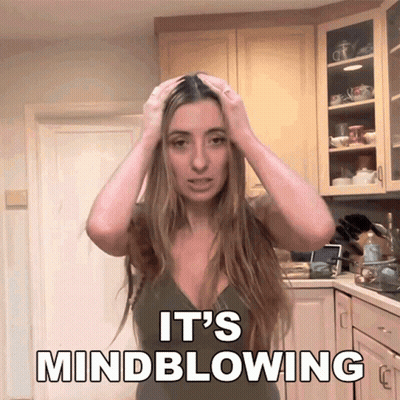 Woman In Kitchen Hands On Head Saying Mindblowing GIF