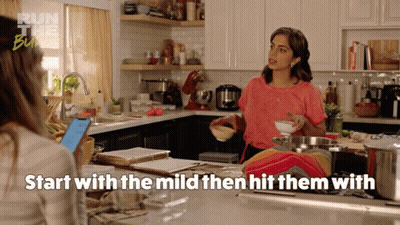 Woman In Kitchen Saying Start With The Mild Then Hit Them With GIF